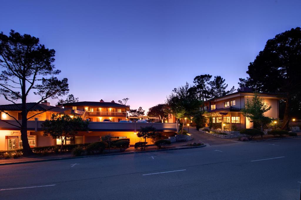 a building on a street at night at Horizon Inn & Ocean View Lodge in Carmel