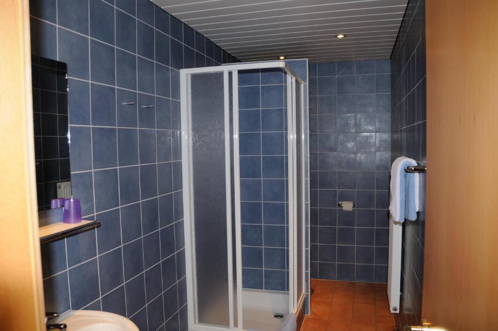 Koupelna v ubytování Strandhotel