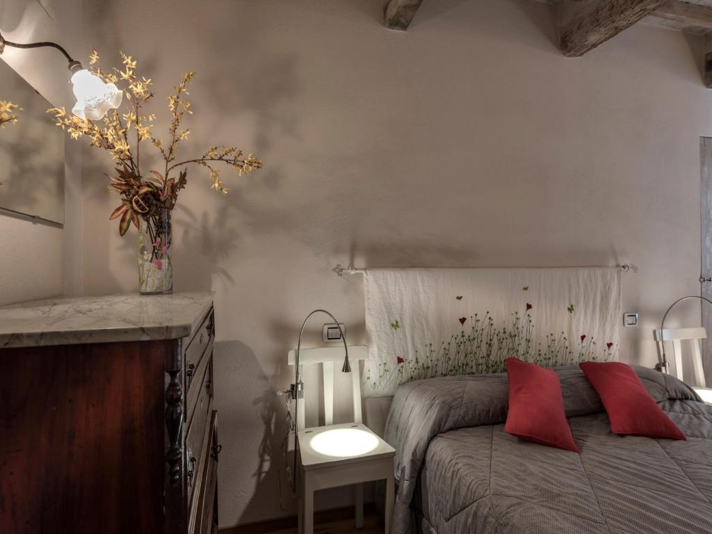 Postel nebo postele na pokoji v ubytování Apartment La Scala 1572