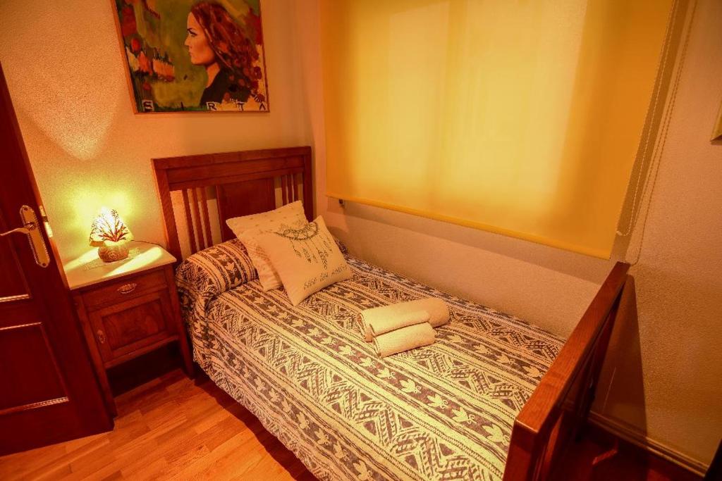 Postel nebo postele na pokoji v ubytování Vivienda Caseiro