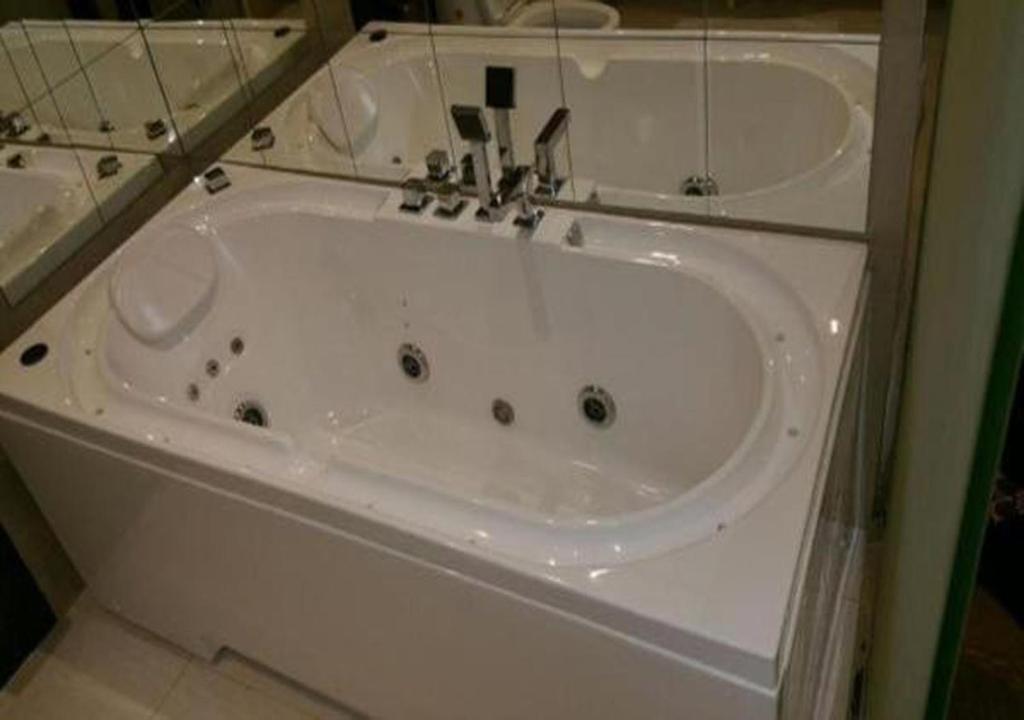 Koupelna v ubytování Rest Night Serviced Apartments- AlHamra