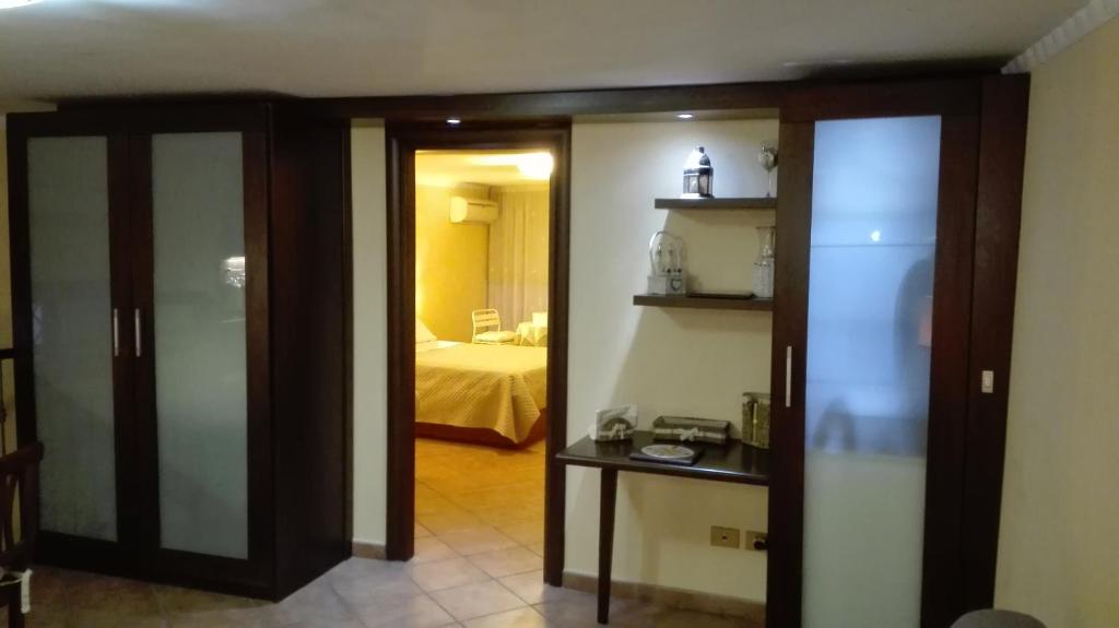 A bed or beds in a room at Domus Ugo
