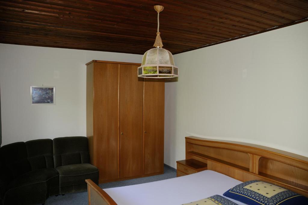 Postel nebo postele na pokoji v ubytování Strandhotel