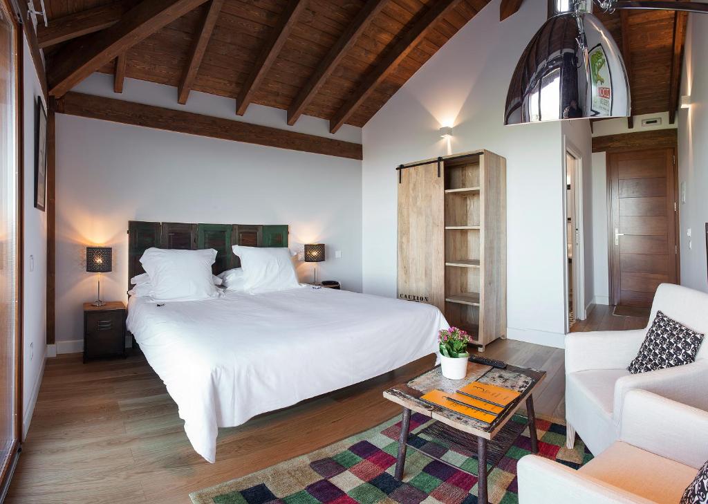 Cama o camas de una habitación en Hotel Rural 3 Cabos
