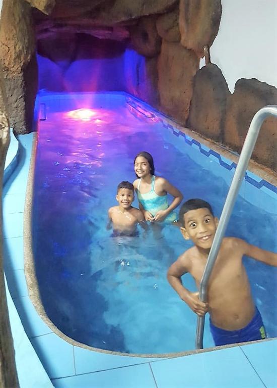 Bazén v ubytování Hotel Coloma Galapagos nebo v jeho okolí