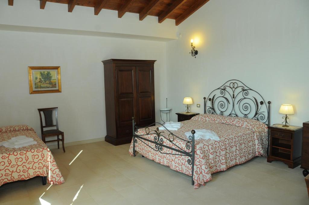 Agriturismo Masseria Quaremme - Habitación Cuádruple Con Vista Al Jardín