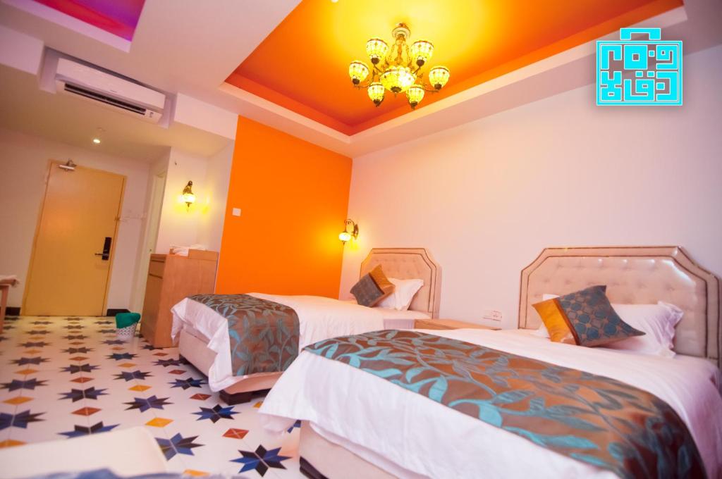 Postel nebo postele na pokoji v ubytování Hotel Hilal