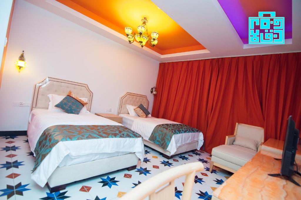 Postel nebo postele na pokoji v ubytování Hotel Hilal