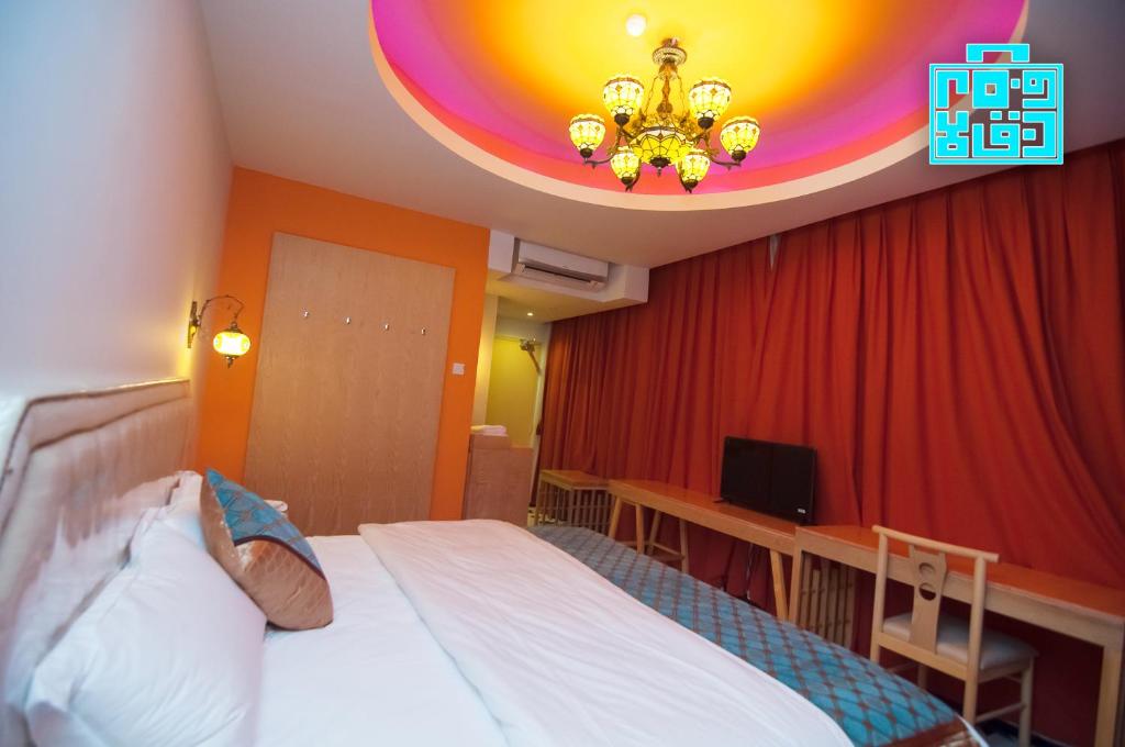 Postel nebo postele na pokoji v ubytování Hotel Hilal