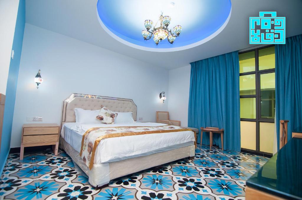 Postel nebo postele na pokoji v ubytování Hotel Hilal