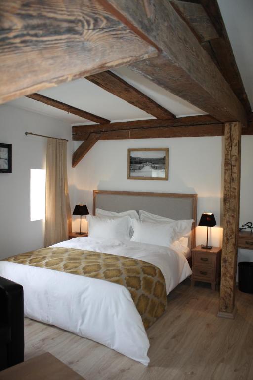 Postel nebo postele na pokoji v ubytování Hotel Hahnmühle 1323