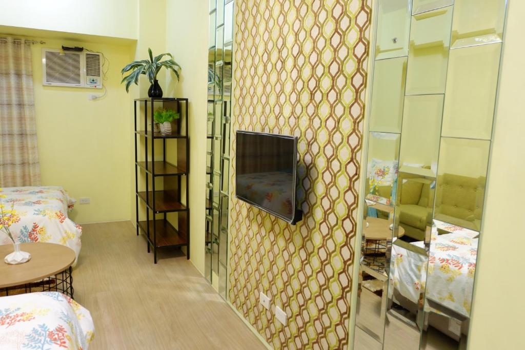 Ortigas inn - Appartement Met Uitzicht Op De Tuin
