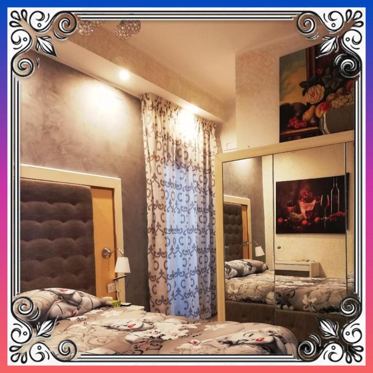 A bed or beds in a room at Max B&B Fiera