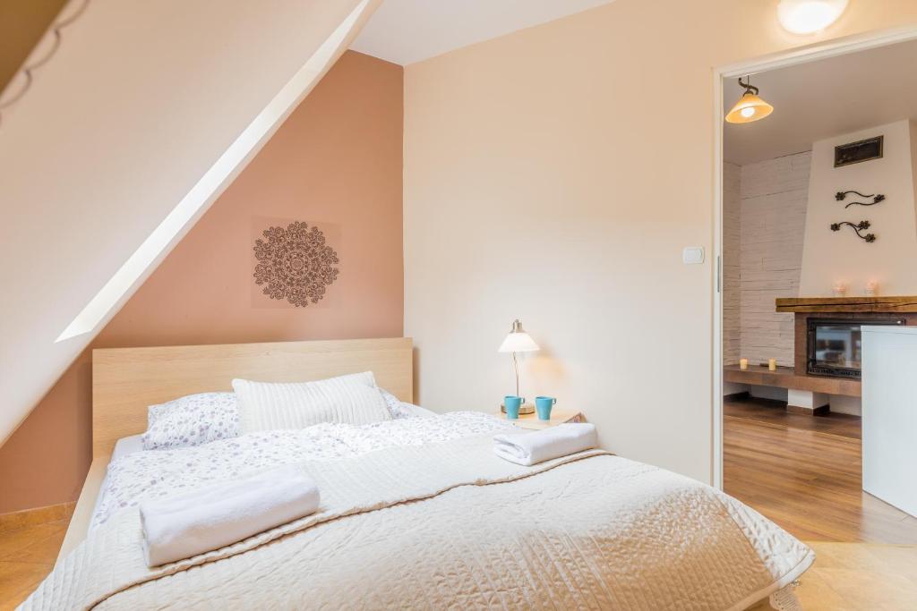 Posteľ alebo postele v izbe v ubytovaní Apartamenty Smrekowa Zakopane