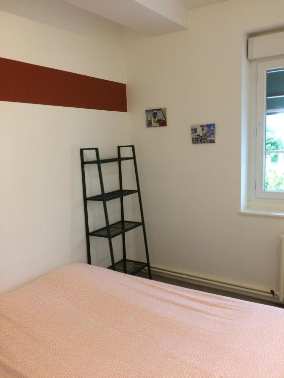 Postel nebo postele na pokoji v ubytování Relais Maximilien