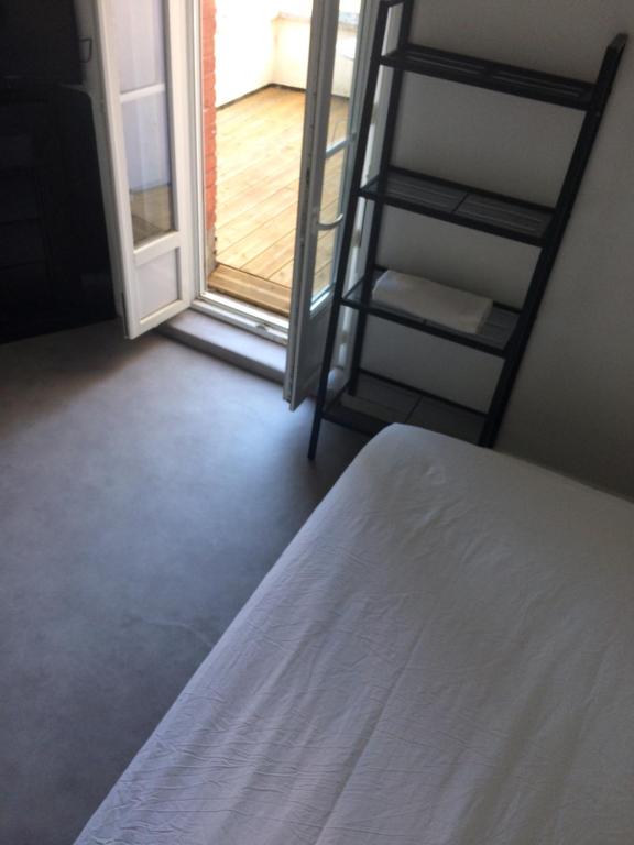 Postel nebo postele na pokoji v ubytování Relais Maximilien