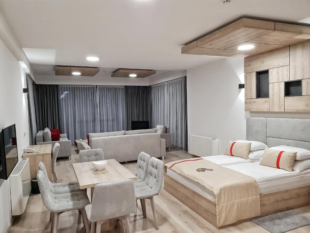 Postel nebo postele na pokoji v ubytování Aparthotel Centar Sarajevo