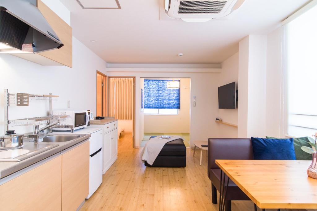Kuchyň nebo kuchyňský kout v ubytování TEN APARTMENT HOTEL