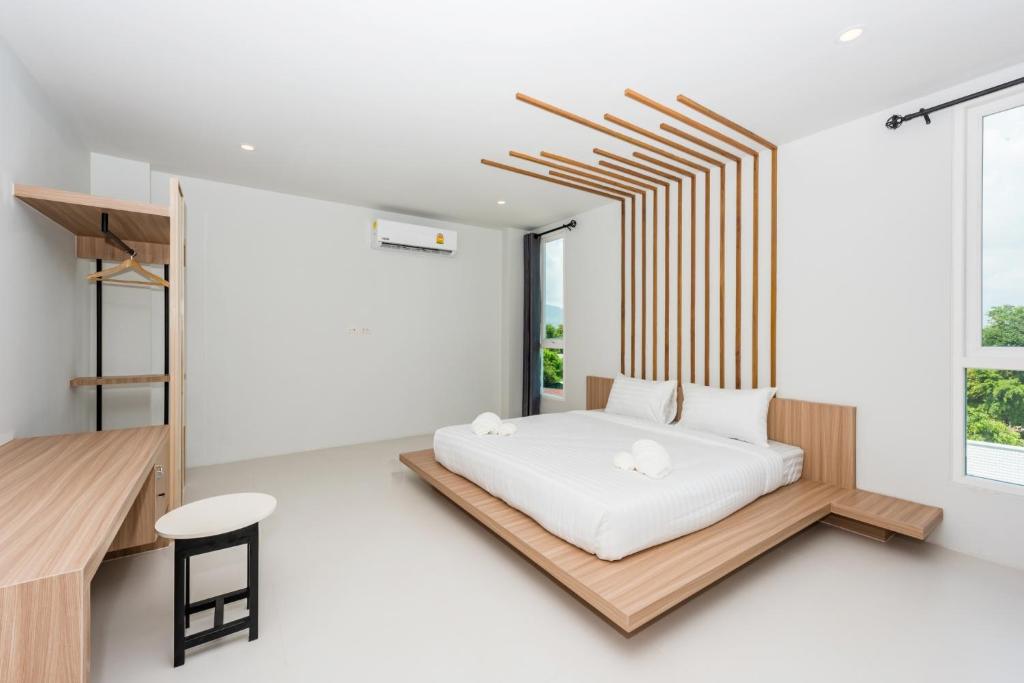 Postel nebo postele na pokoji v ubytování Phuket Marine Poshtel - SHA Plus