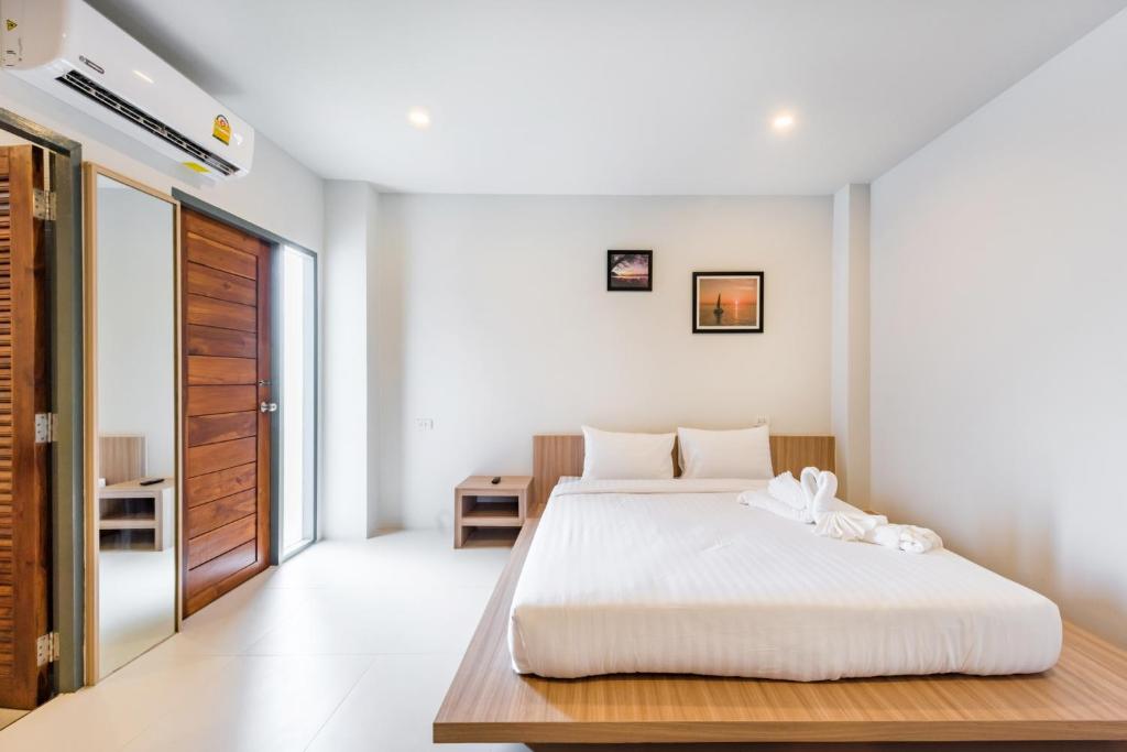 Postel nebo postele na pokoji v ubytování Phuket Marine Poshtel - SHA Plus
