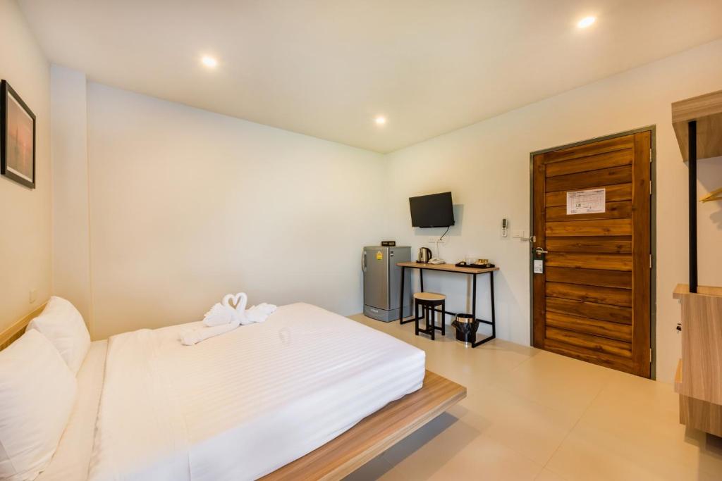 Postel nebo postele na pokoji v ubytování Phuket Marine Poshtel - SHA Plus