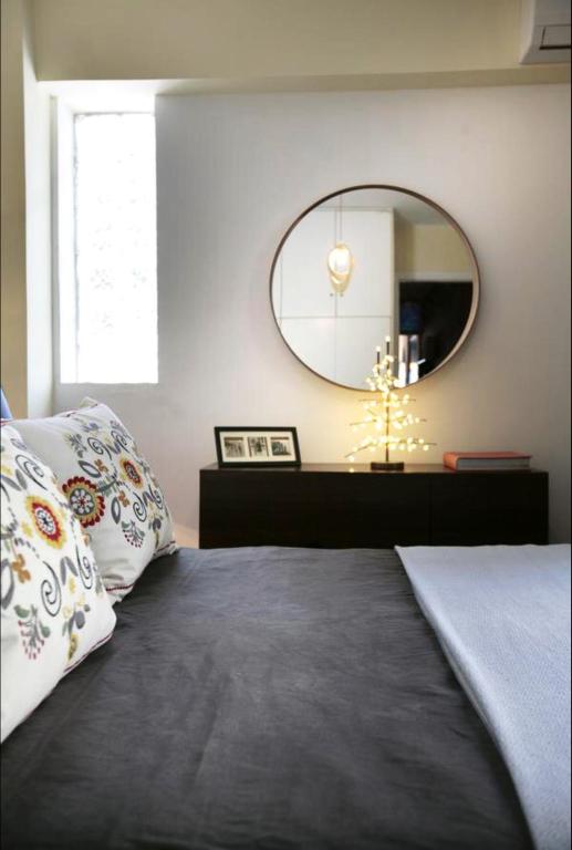Posteľ alebo postele v izbe v ubytovaní Mets Area, Hip, Tasteful & Ultra Convenient Studio for 2