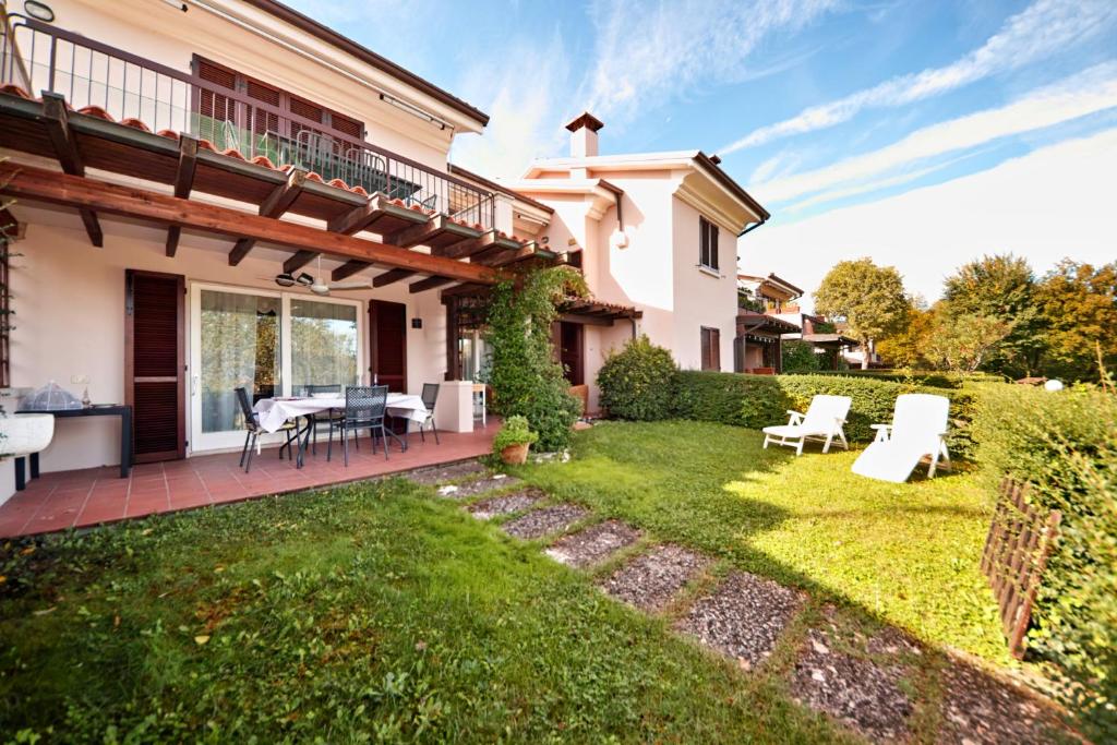 Vonkajšia záhrada v ubytovaní Vista Lago