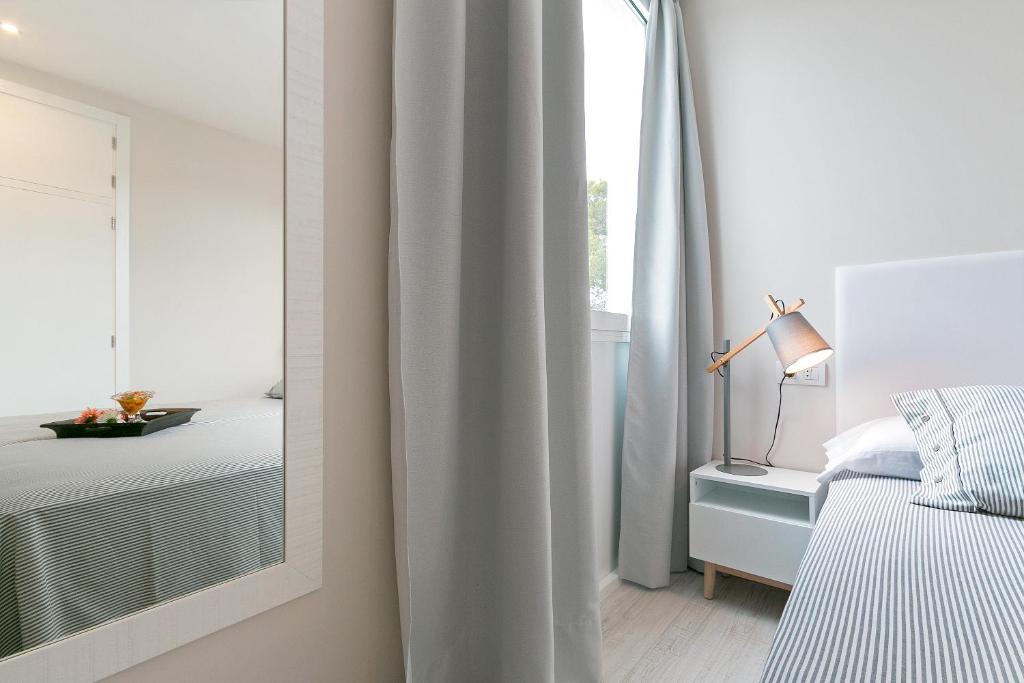 Postel nebo postele na pokoji v ubytování Apartment Sirella 1