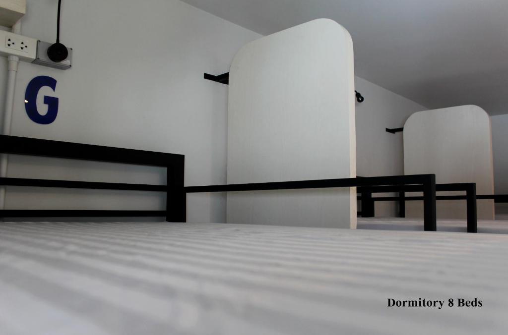 Postel nebo postele na pokoji v ubytování Phuket Marine Poshtel - SHA Plus