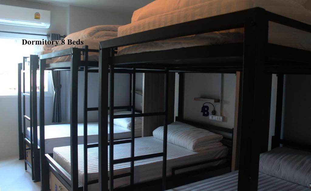 Postel nebo postele na pokoji v ubytování Phuket Marine Poshtel - SHA Plus