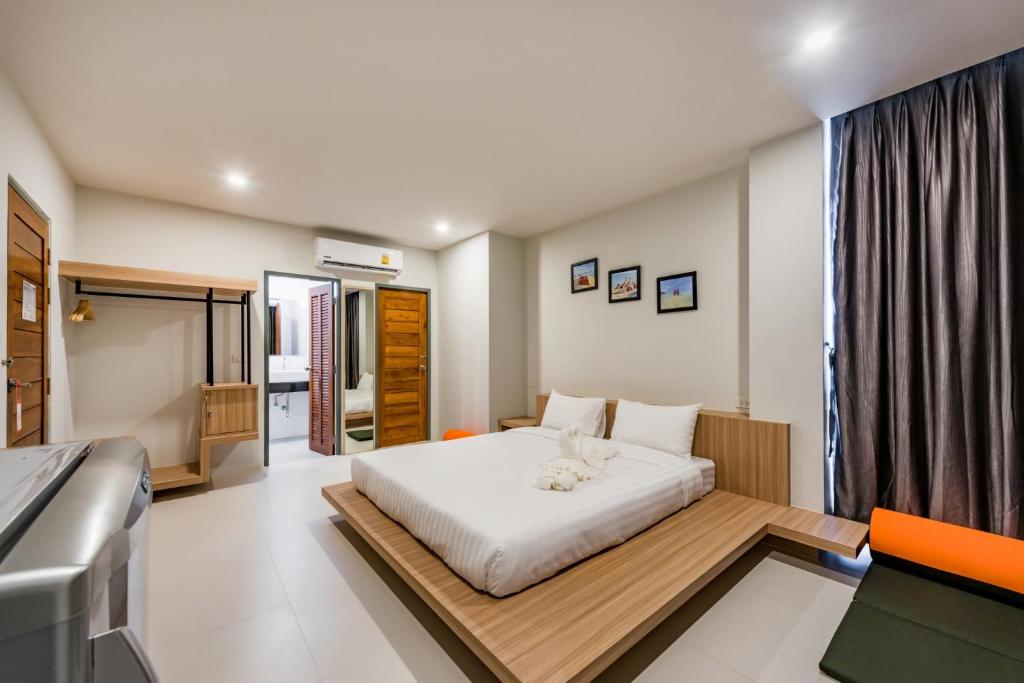 Postel nebo postele na pokoji v ubytování Phuket Marine Poshtel - SHA Plus