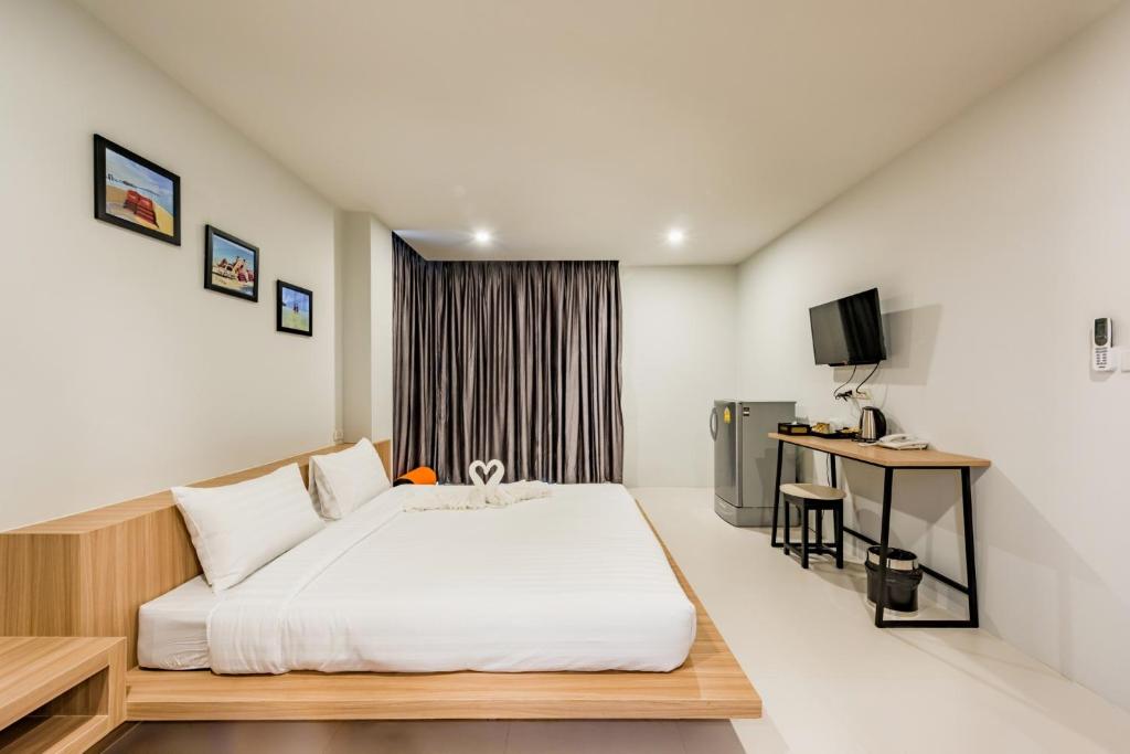 Postel nebo postele na pokoji v ubytování Phuket Marine Poshtel - SHA Plus