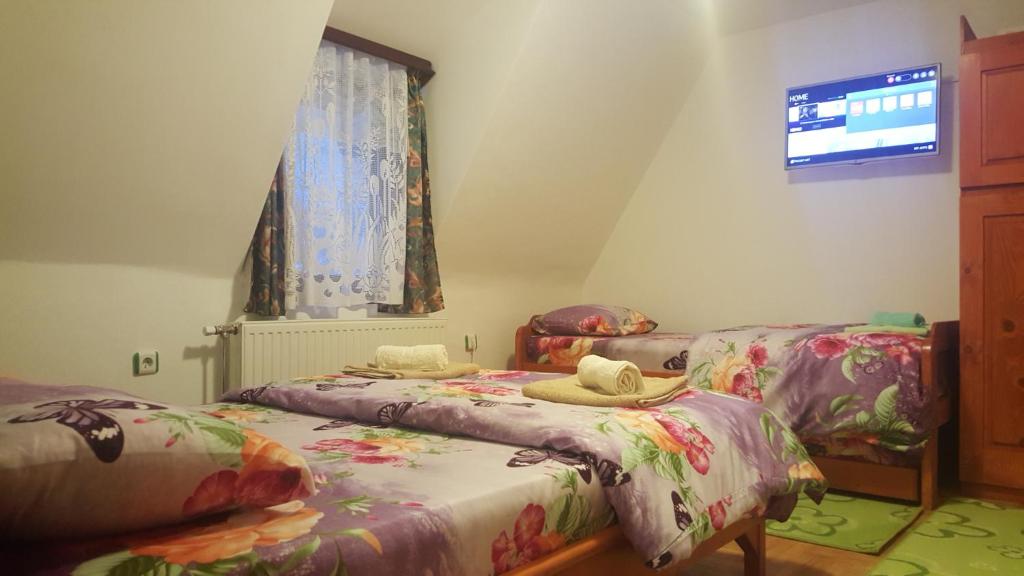 Postel nebo postele na pokoji v ubytování Marko'S Apartments