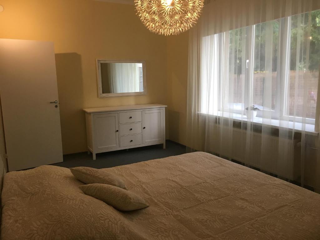 Postel nebo postele na pokoji v ubytování Liivalaia Apartment