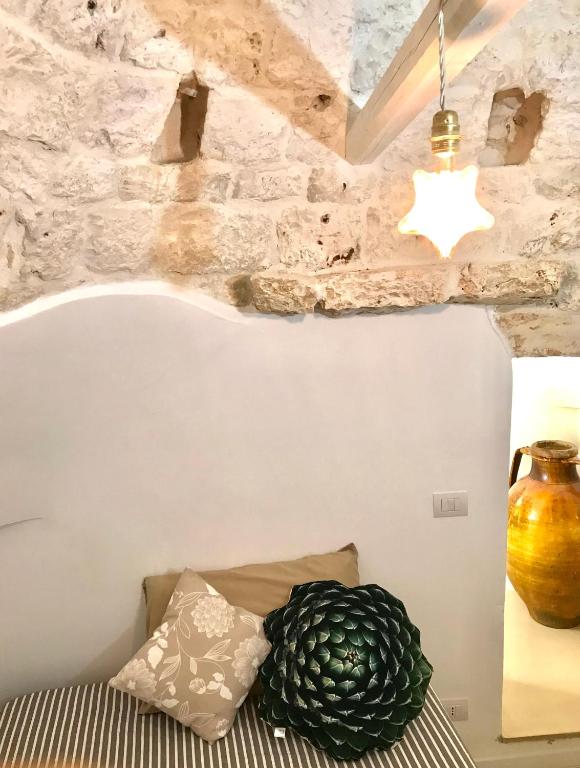 A seating area at Trulli Storie di Puglia - Private Pool