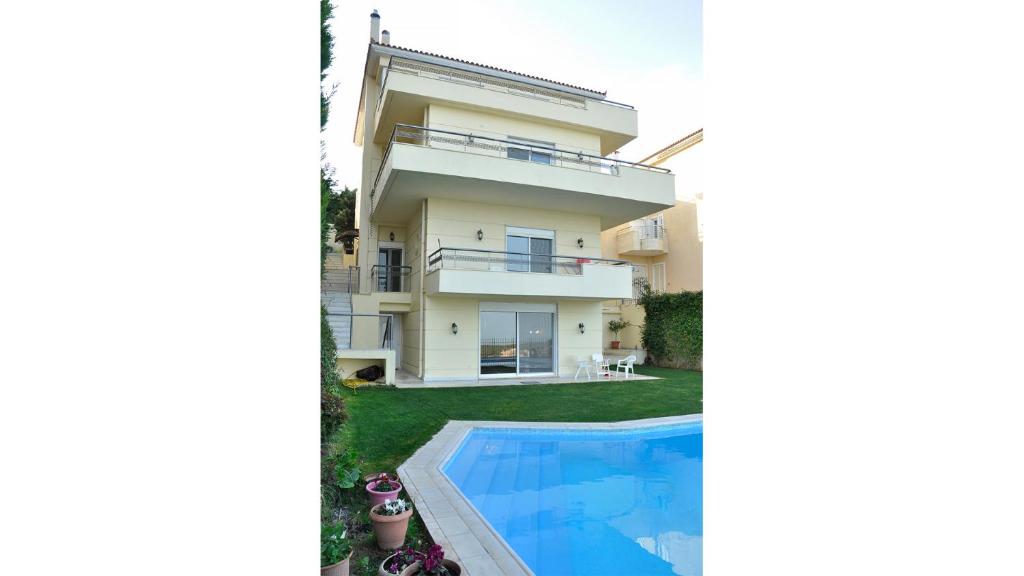 The swimming pool at or close to Villa Olympia VIP