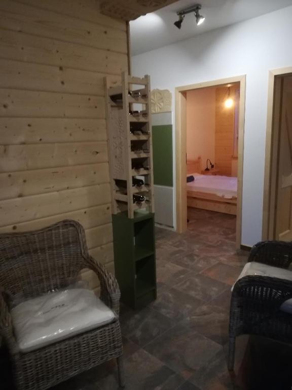 Posteľ alebo postele v izbe v ubytovaní Apartament Zielony
