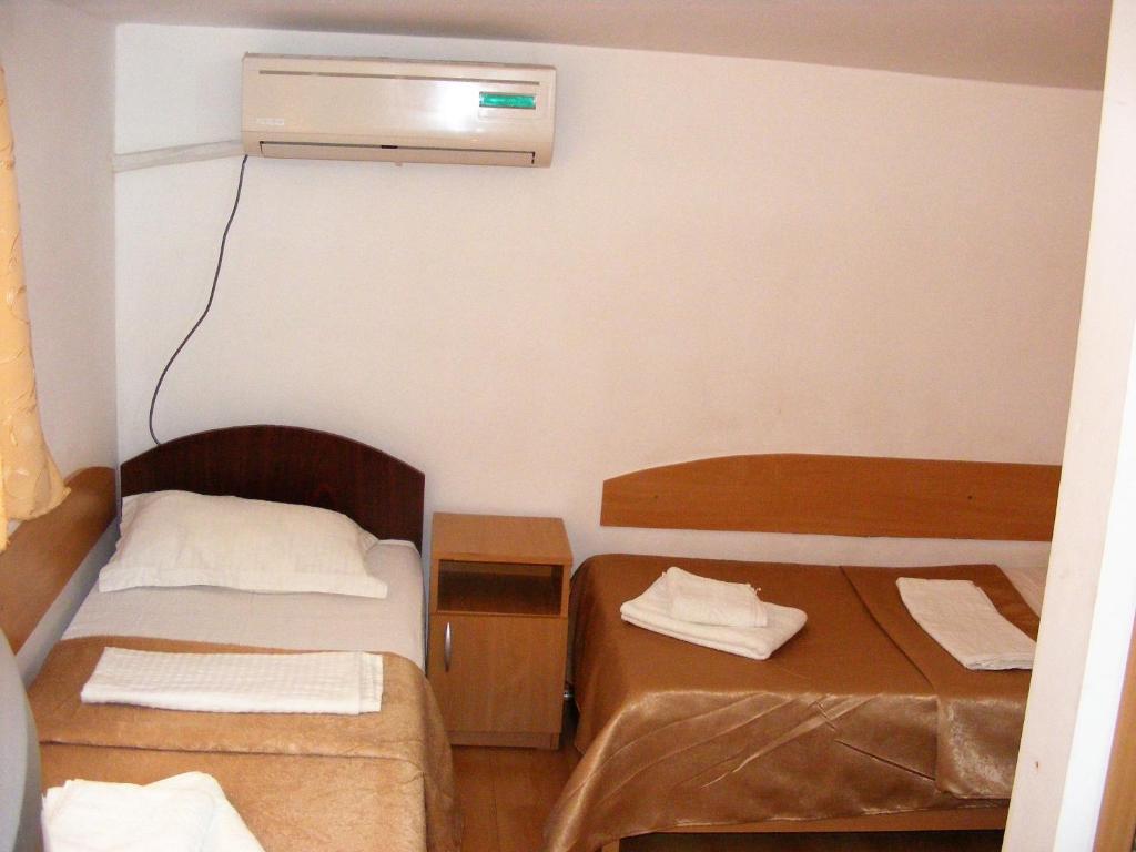 Letto o letti in una camera di Pensiunea Melisa