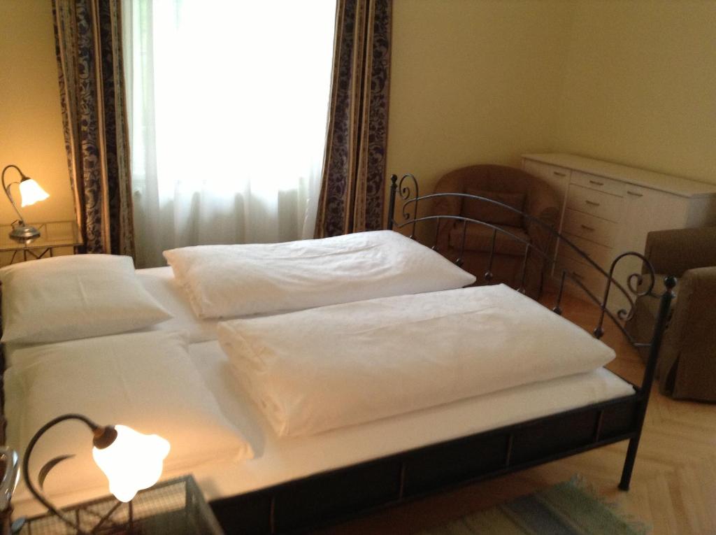 Postel nebo postele na pokoji v ubytování Villa Engstler - Appartments