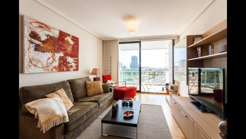 O zonă de relaxare la Apartamento en la Ciudad de las Ciencias y cerca de la playa
