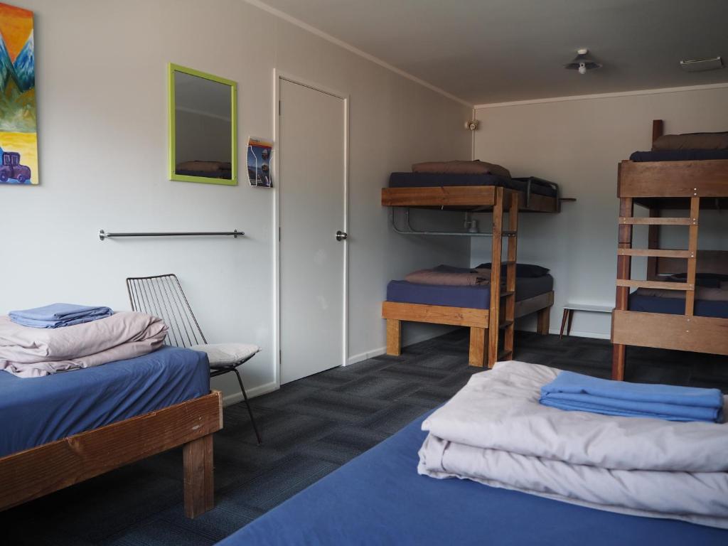 Postel nebo postele na pokoji v ubytování Tasman Bay Backpackers