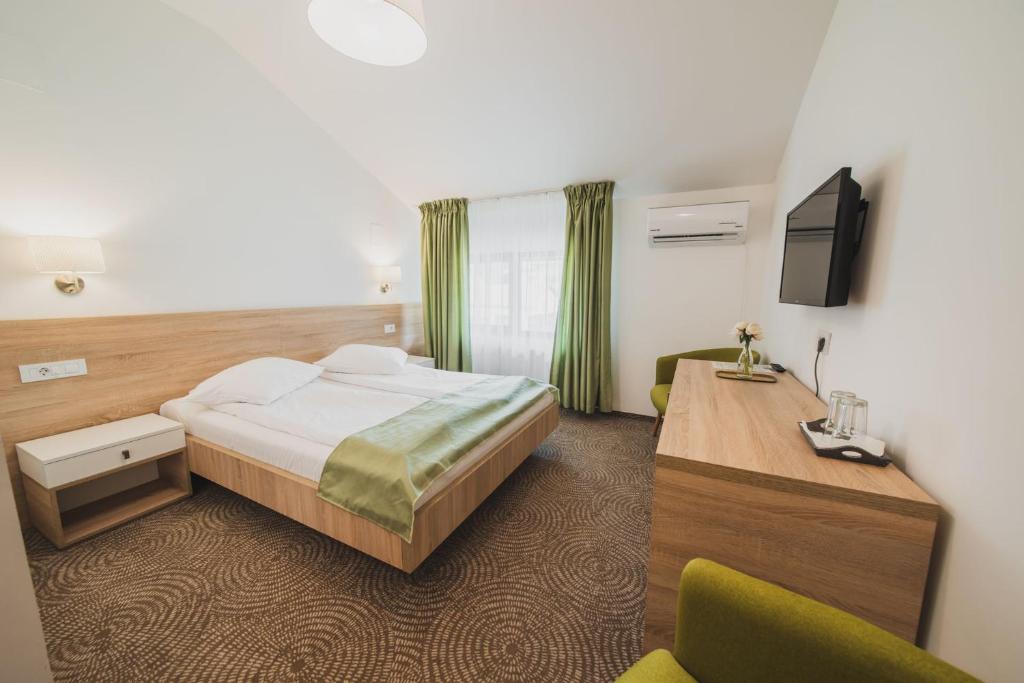 Postel nebo postele na pokoji v ubytování Hotel DADA Termal