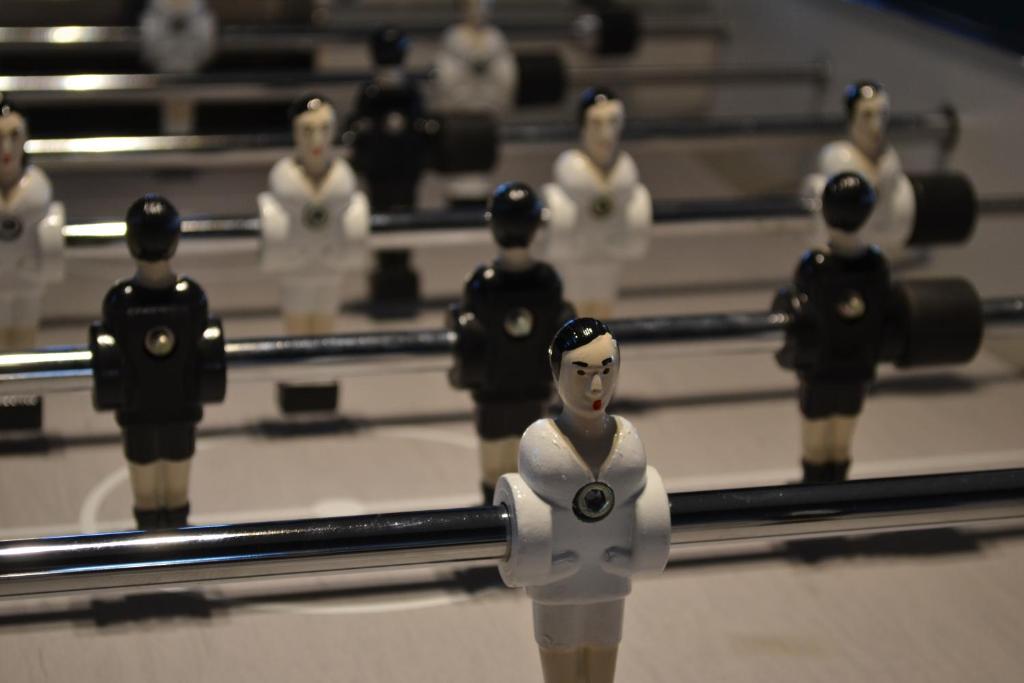 a group of toy figurines in front of mirrors at Vue d'en Haut in Durbuy