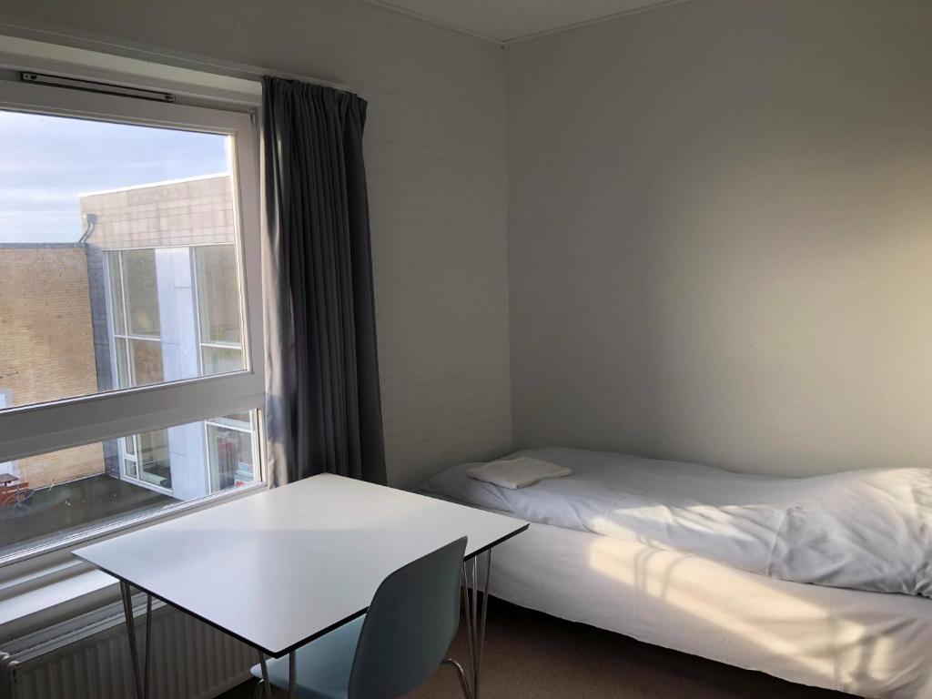 Postel nebo postele na pokoji v ubytování Danhostel Nørresundby Skansen