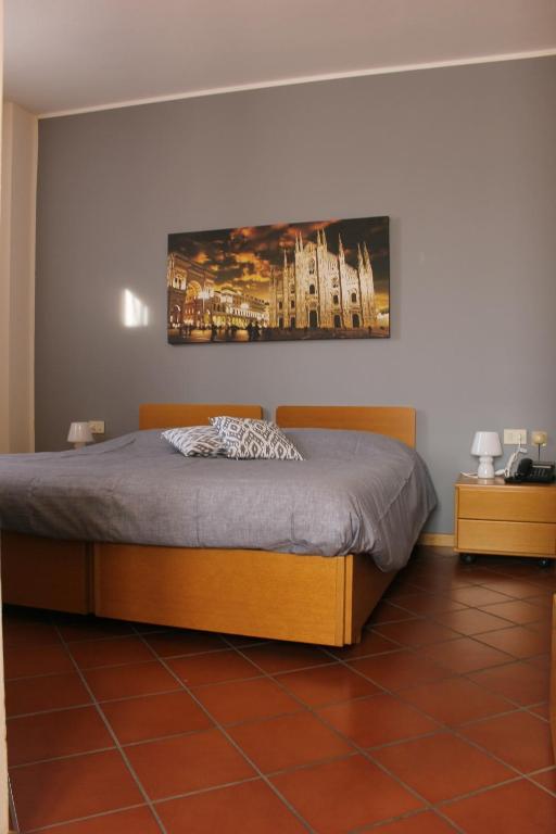 Voodi või voodid majutusasutuse ALBERGO LA SCALETTA toas