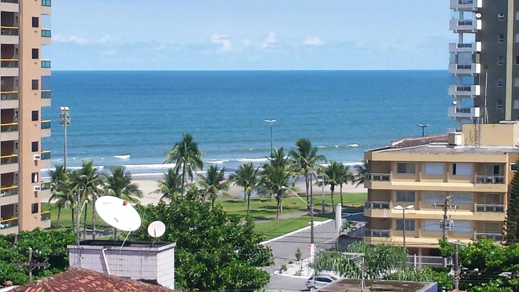 a view of the ocean from a building at Vila Caiçara Nice Location - Linda Vista ! in Solemar