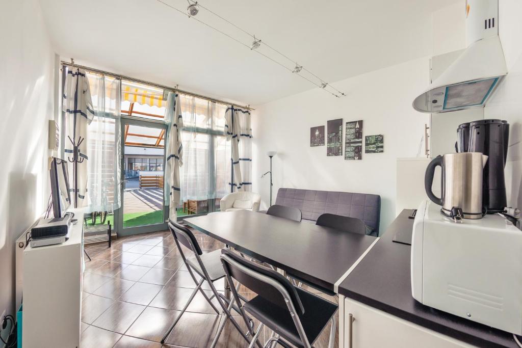Kuchyň nebo kuchyňský kout v ubytování Apartamenty Sun & Snow Międzyzdrojski Rynek