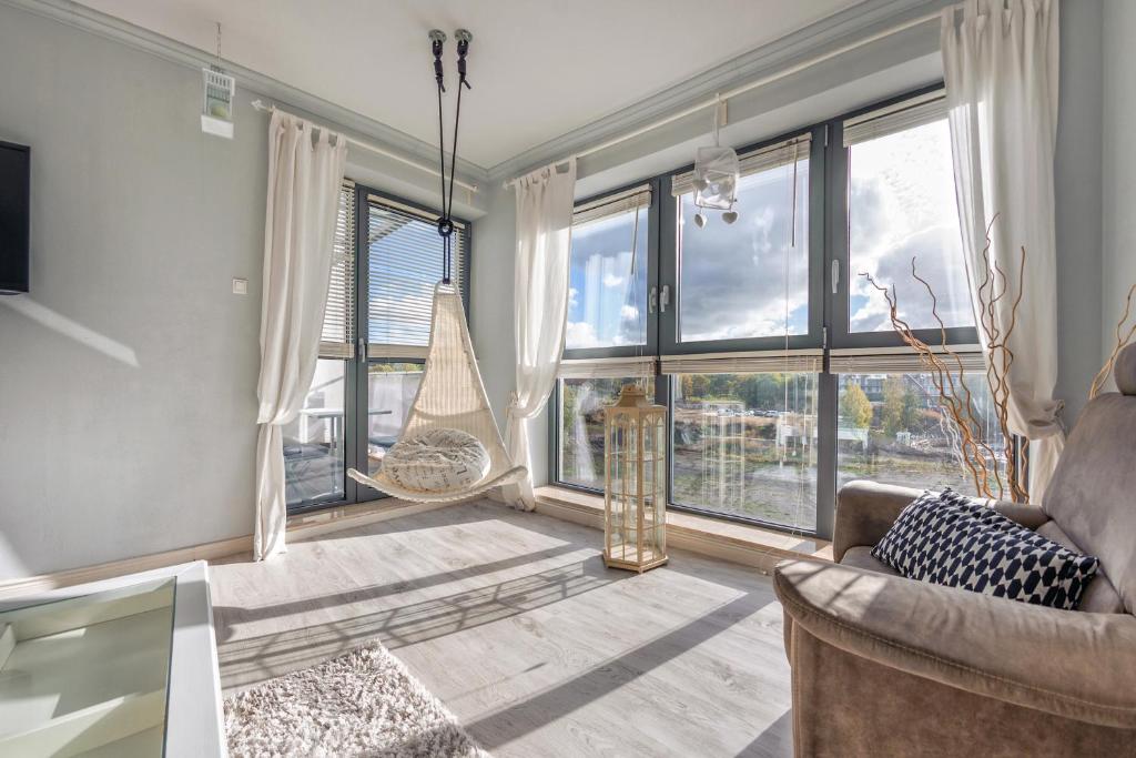 Postel nebo postele na pokoji v ubytování Apartamenty Sun & Snow Międzyzdrojski Rynek