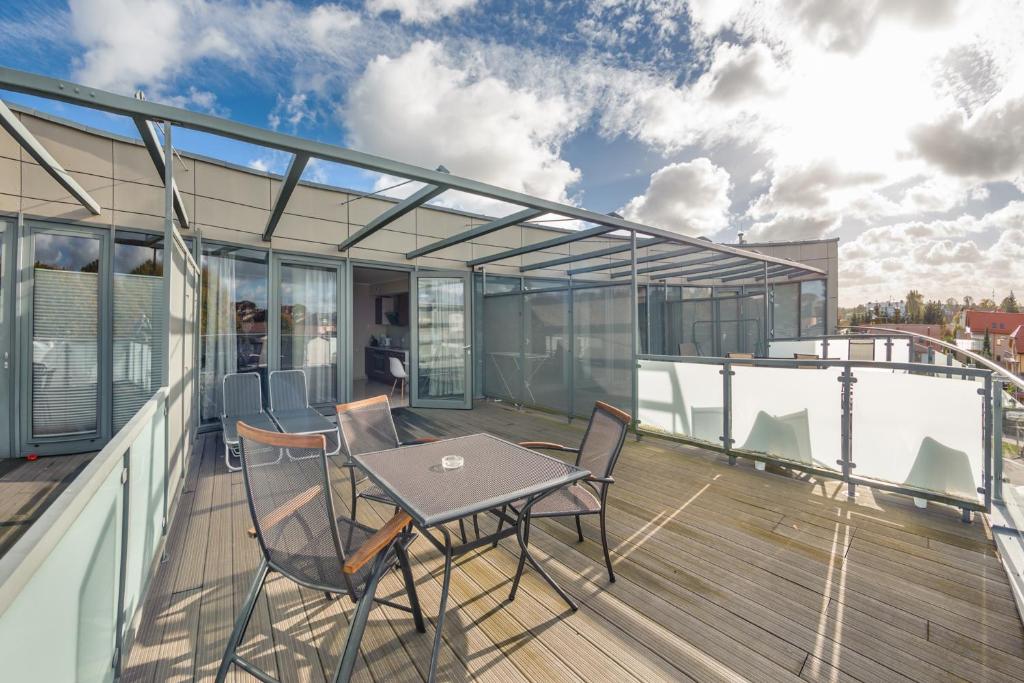 Balkón nebo terasa v ubytování Apartamenty Sun & Snow Międzyzdrojski Rynek