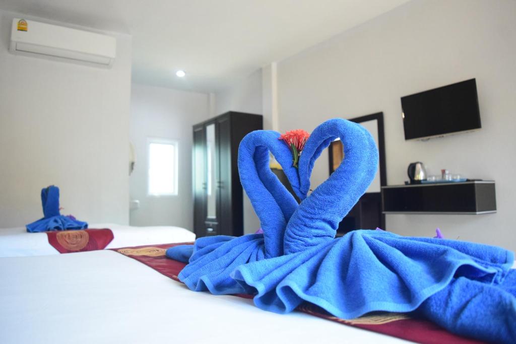 Postel nebo postele na pokoji v ubytování Tamarind Lanta Resort